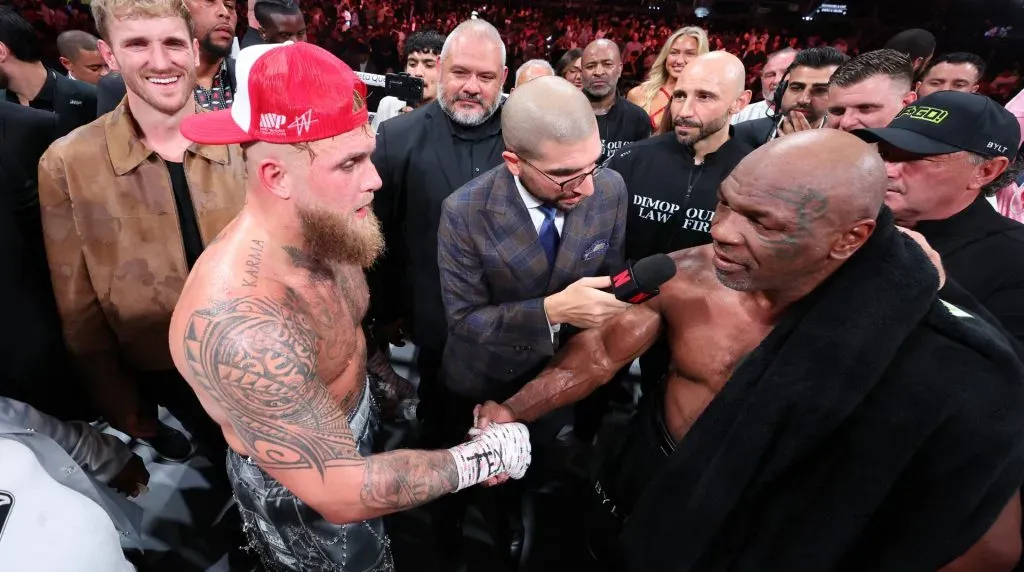 (L-R) Jake Paul announced as winner against Mike Tyson during LIVE On Netflix: Jake Paul vs. Mike Tyson at AT&T Stadium on November 15, 2024 in Arlington, Texas. (Photo by Al Bello/Getty Images for Netflix © 2024)