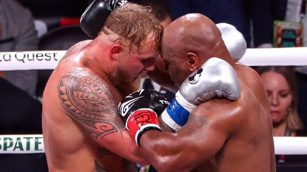 Jake Paul honors Mike Tyson after his unanimous-decision win during a heavyweight bout at AT&T Stadium. IMAGO / Inpho Photography
