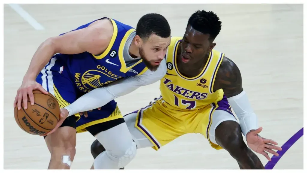 Golden State Warriors guard Stephen Curry (30) is defended by Los Angeles Lakers guard Dennis Schroder (17) during an NBA, Basketball Herren, USA basketball Western Conference semifinal game 6 at Crypto.com Arena, Friday, May 12, 2023, in Los Angeles.