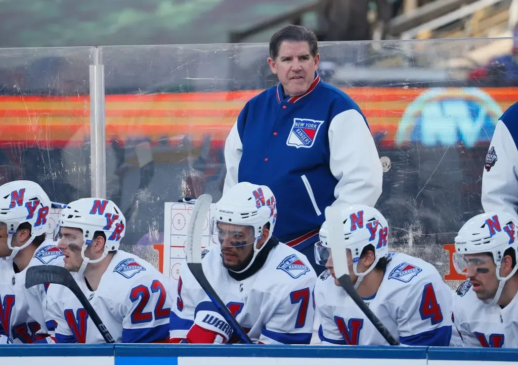 Head coach Peter Laviolette of the New York Rangers handles the bench against the New York Islanders during the 2024 Navy Federal Credit Union Stadium Series game at MetLife Stadium on February 18, 2024 in East Rutherford, New Jersey.