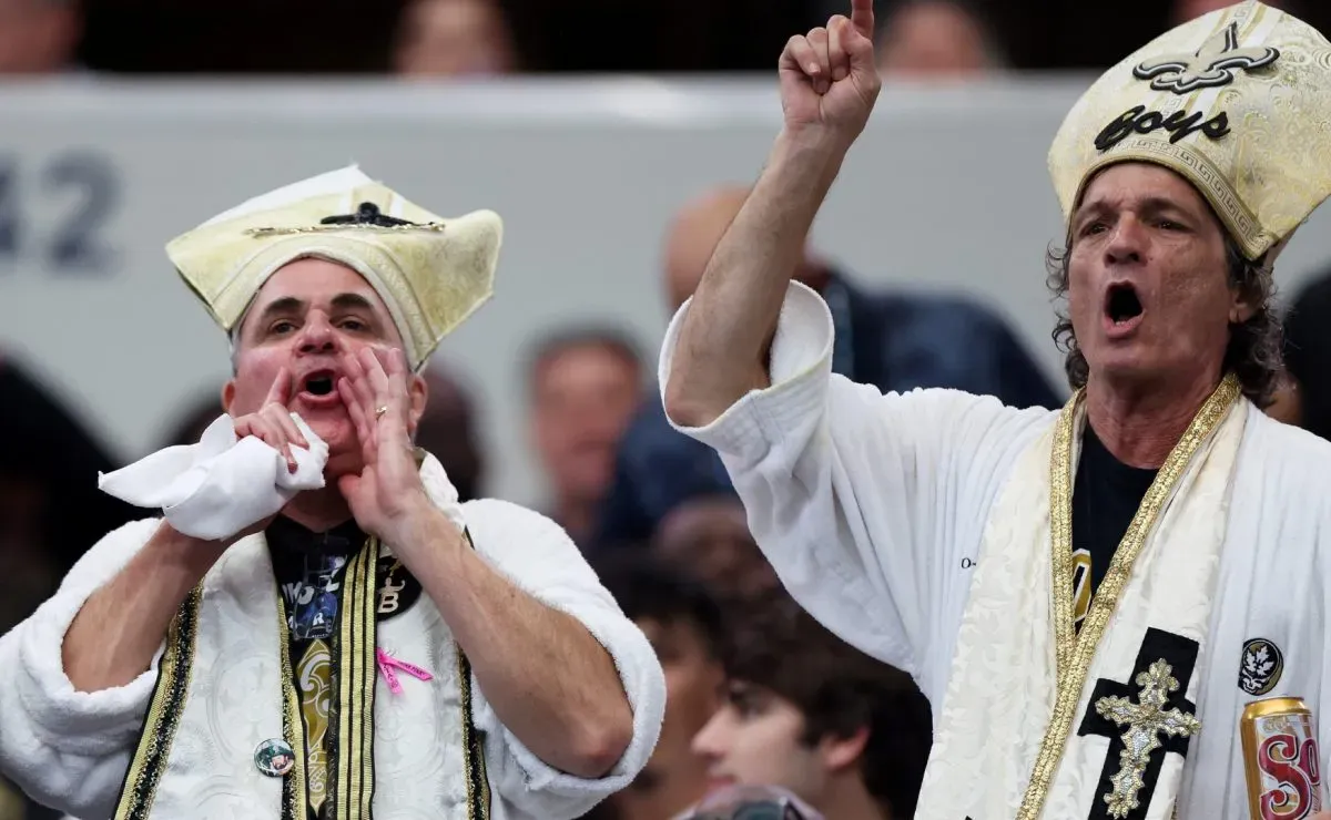New Orleans Saints fans cheer during the game against the Dallas Cowboys at AT&T Stadium in 2024. (Source: Ron Jenkins/Getty Images)