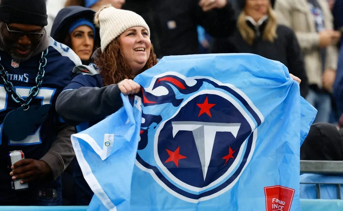 A Tennessee Titans fan cheers during a game against the Carolina Panthers in 2023. (Source: Wesley Hitt/Getty Images)