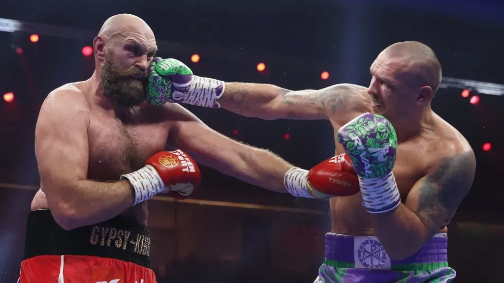 Oleksandr Usyk punches Tyson Fury during the IBF, IBO, WBA, WBC and WBO Undisputed World Heavyweight titles’ fight ( Richard Pelham/Getty Images)