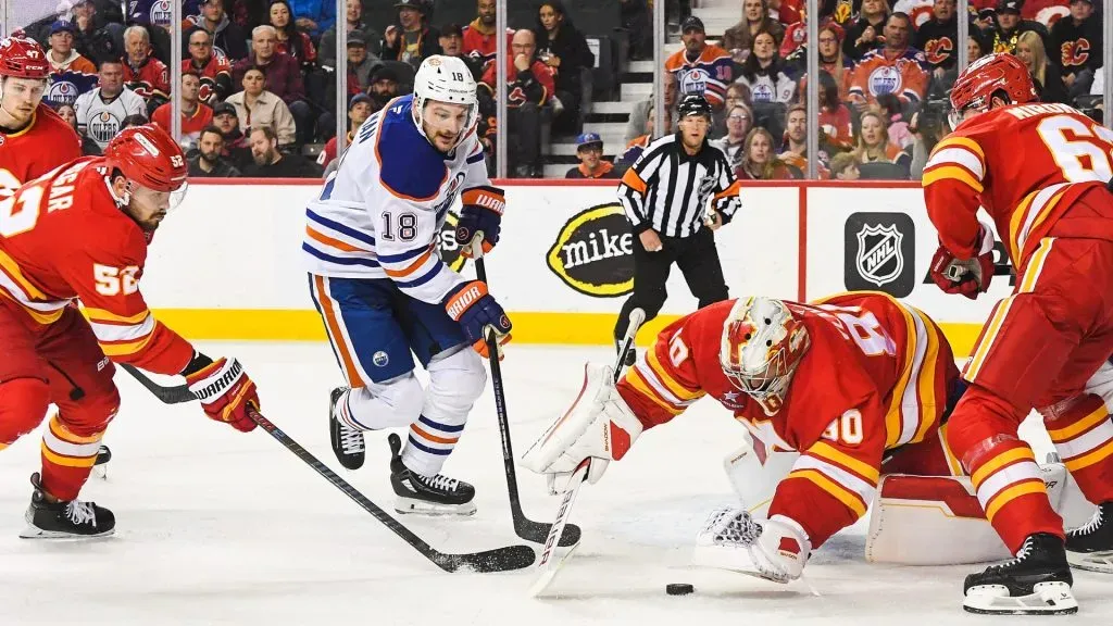 Daniel Vladar #80 of the Calgary Flames stops a shot from Zach Hyman #18 of the Edmonton Oilers during the second period at Scotiabank Saddledome on November 3, 2024. (Source: Derek Leung/Getty Images)