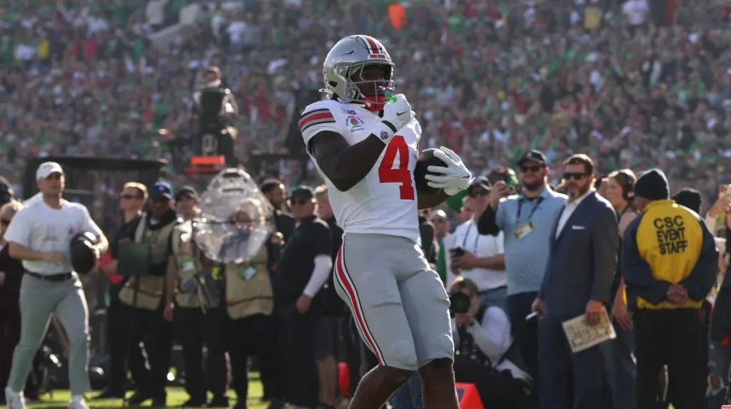 Jeremiah Smith #4 of the Ohio State Buckeyes scores a touchdown during the first quarter against the Oregon Ducks during the Rose Bowl Game Presented by Prudential at Rose Bowl Stadium on January 01, 2025 in Pasadena, California.