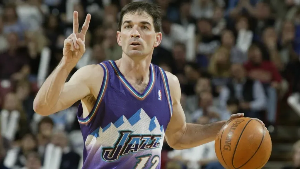 John Stockton #12 of the Utah Jazz dribbles in Game five of the Western Conference Quarterfinals against the Sacramento Kings during the 2003 NBA Playoffs. (Source: Jed Jacobsohn/Getty Images)