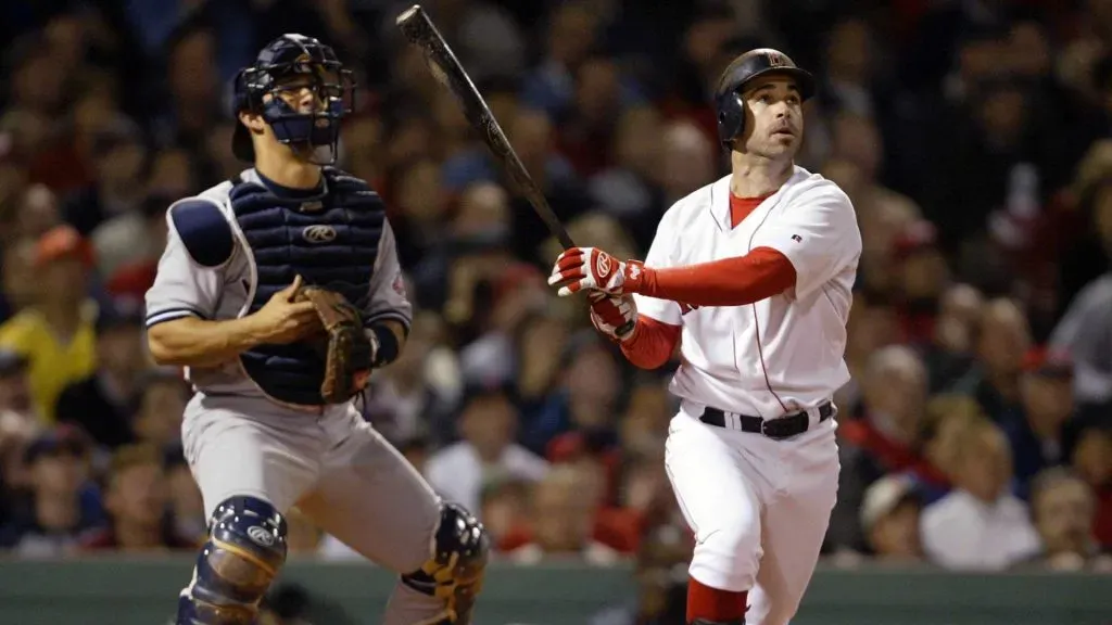 Todd Walker #12 of the Boston Red Sox hits a home run in the bottom of the fourth inning of Game 4 of the 2003 American League Championship Series against the New York Yankees October 13, 2003. (Source: Jed Jacobsohn/Getty Images)