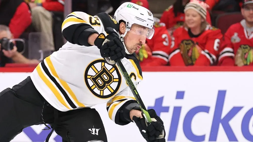 Brad Marchand #63 of the Boston Bruins takes a shot on goal against the Chicago Blackhawks during the first period at the United Center on December 04, 2024 in Chicago, Illinois.