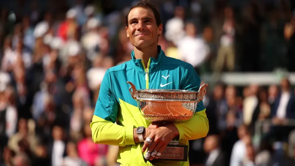 Rafael Nadal of Spain poses with the trophy after winning against Casper Ruud of Norway during the Men’s Singles Final match on Day 15 of The 2022 French Open. (Source: Adam Pretty/Getty Images)