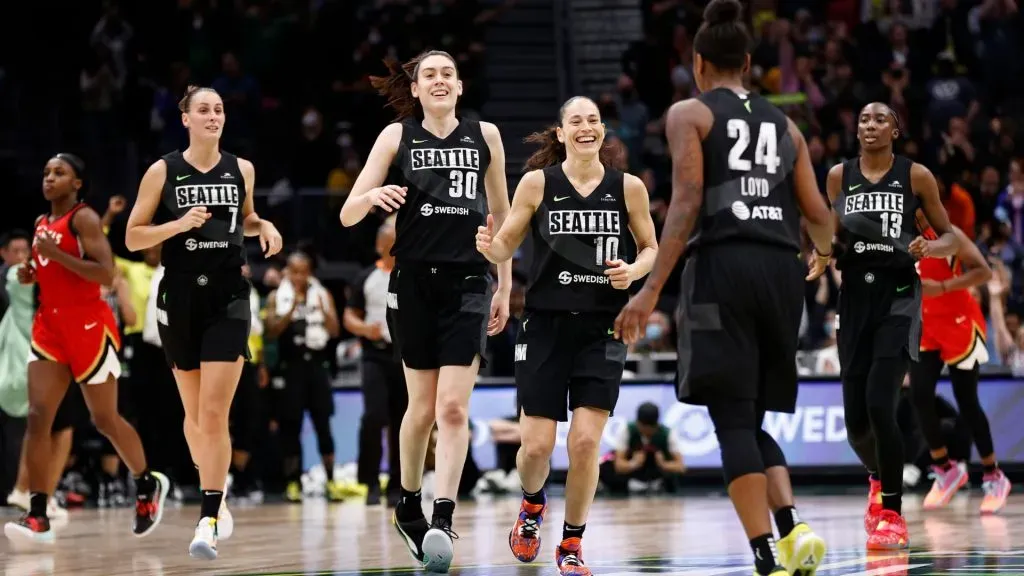 Stephanie Talbot, Breanna Stewart, Sue Bird and Ezi Magbegor of the Seattle Storm celebrate a three point basket by Jewell Loyd during the fourth quarter against the Las Vegas Aces in 2022. (Source: Steph Chambers/Getty Images)
