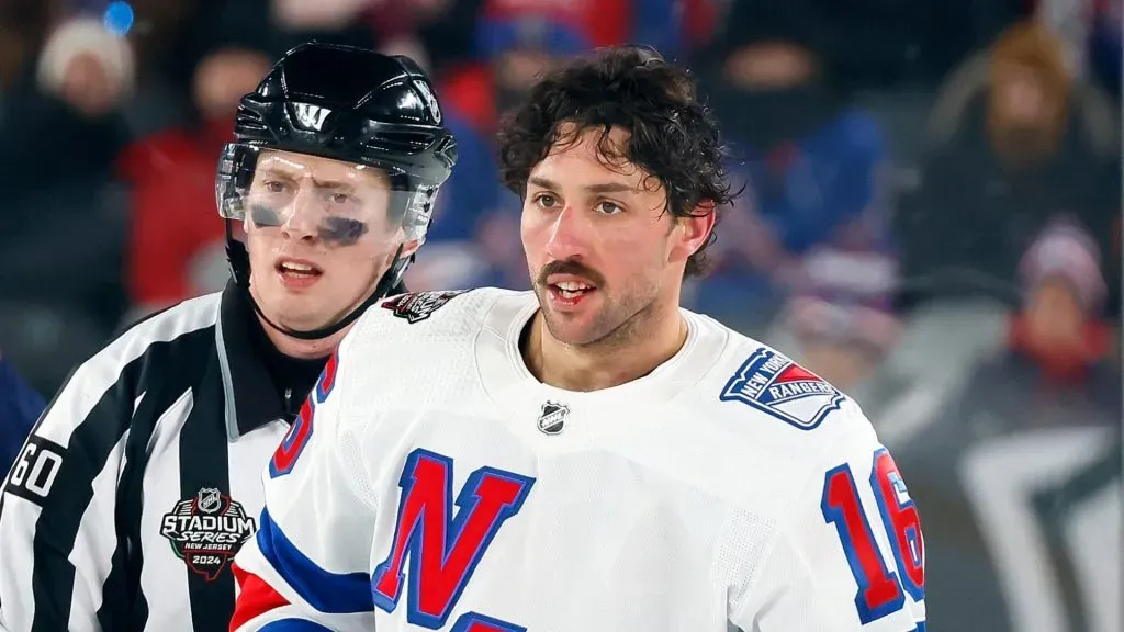 Vincent Trocheck #16 of the New York Rangers is called for a roughing penalty against the New York Islanders during the third period during the 2024 Navy Federal Credit Union Stadium Series at MetLife Stadium on February 18, 2024 in East Rutherford, New Jersey.