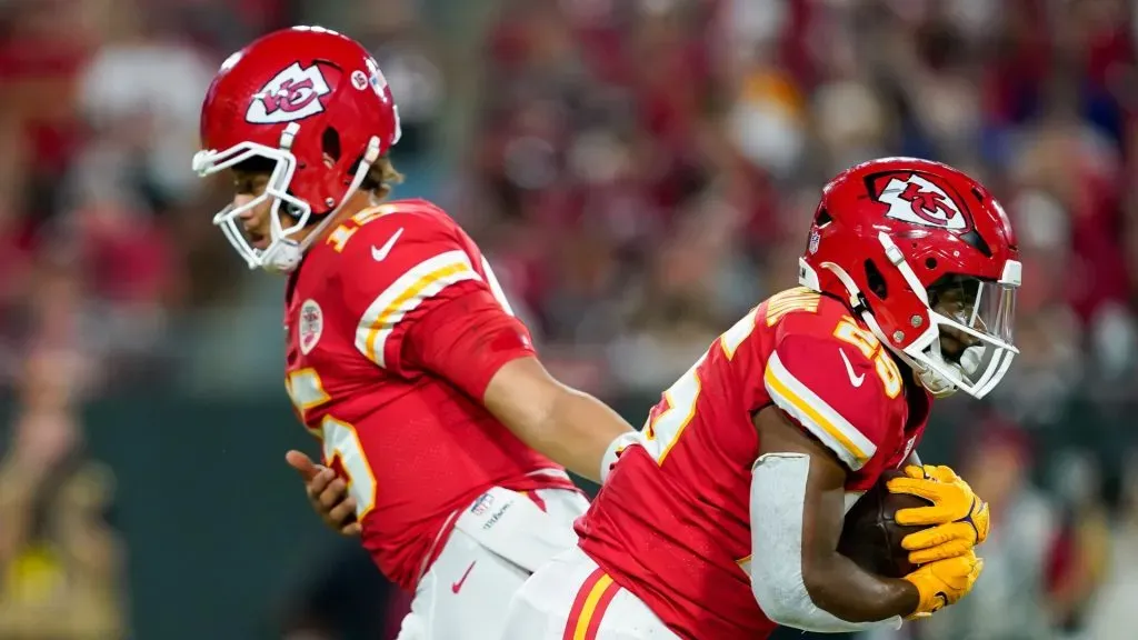 Patrick Mahomes (15) hands off the ball to Kansas City Chiefs running back Clyde Edwards-Helaire.