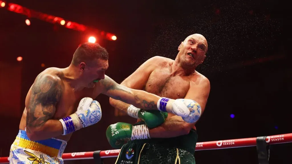 Oleksandr Usyk punches Tyson Fury during the IBF, WBA, WBC, WBO and Undisputed Heavyweight titles’ fight between Tyson Fury and Oleksandr Usyk at Kingdom Arena on May 18, 2024 in Riyadh, Saudi Arabia. (Photo by Richard Pelham/Getty Images)