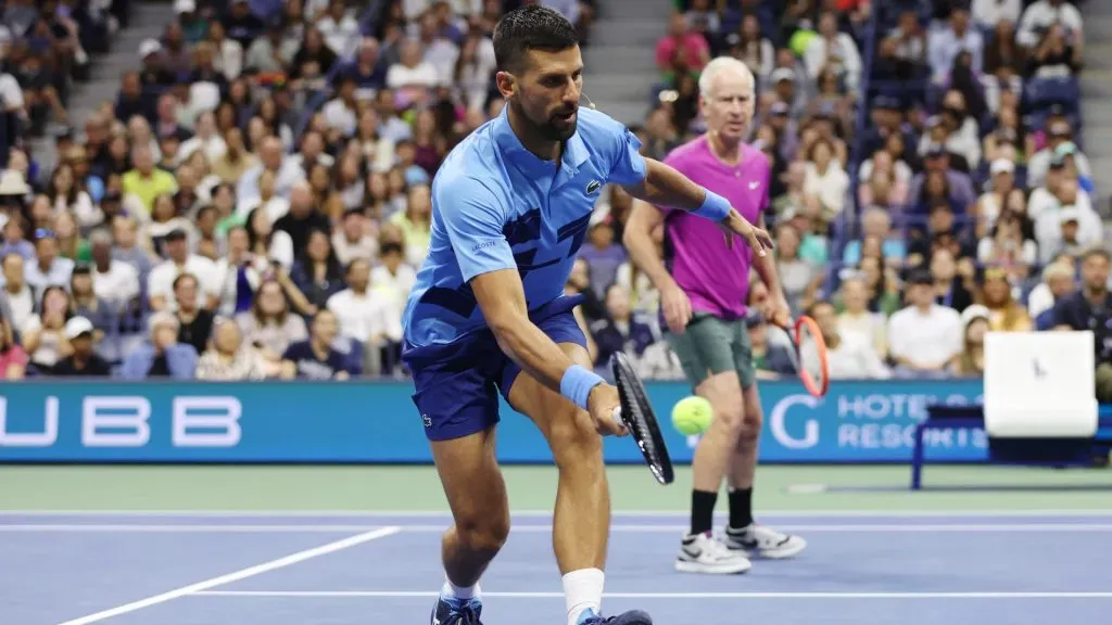 Former professional tennis player John McEnroe and Novak Djokovic play against former professional tennis player Andre Agassi and Carlos Alcaraz. (Sarah Stier/Getty Images)