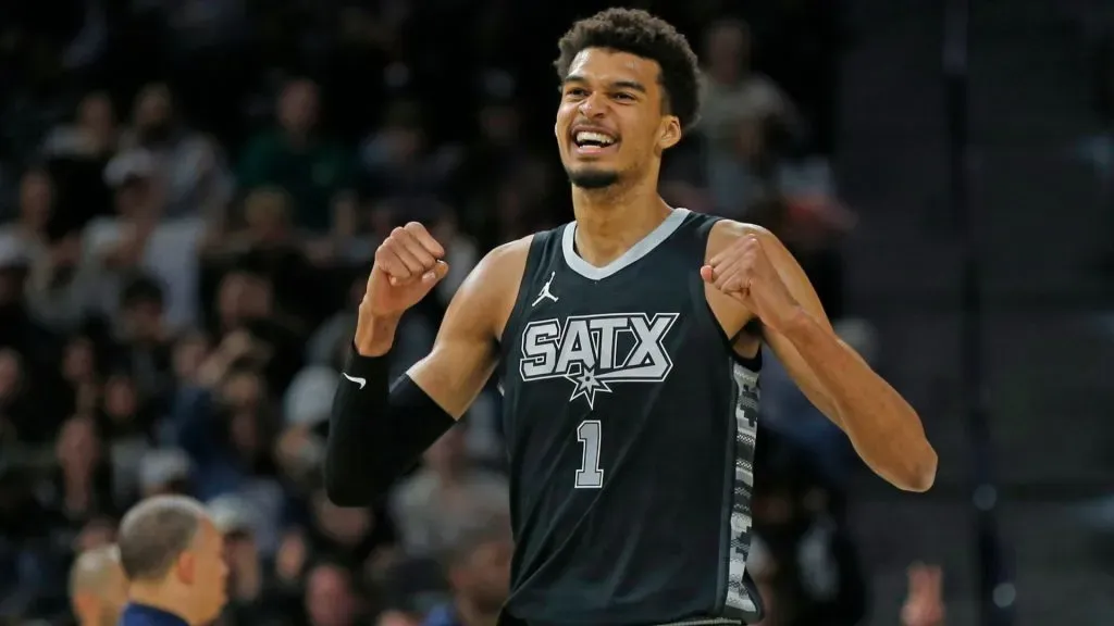 Victor Wembanyama #1 of the San Antonio Spurs reacts after a basket against the Los Angeles Clippers.