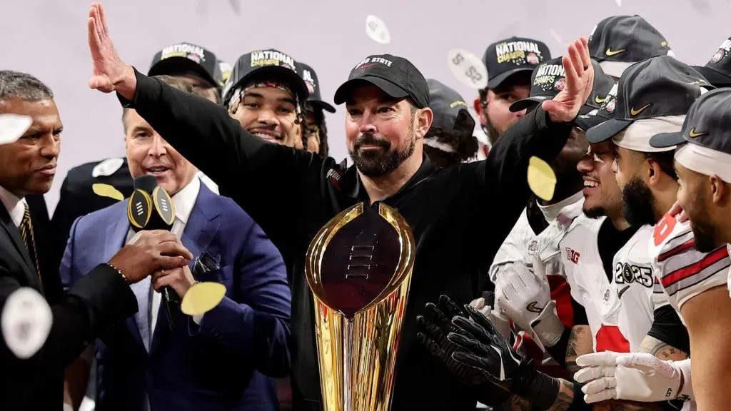 Head coach Ryan Day of the Ohio State Buckeyes celebrates with his team after defeating the Notre Dame Fighting Irish 34-23 in the 2025 CFP National Championship at the Mercedes-Benz Stadium on January 20, 2025 in Atlanta, Georgia.