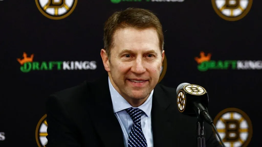 Boston Bruins interim head coach Joe Sacco smiles at his news conference following their 1-0 win over the Utah Hockey Club at TD Garden on November 21, 2024 in Boston, Massachusetts.