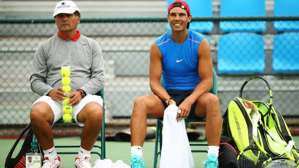 Toni Nadal and Rafael Nadal of Spain chat during a practice session ahead of the Rio 2016 Olympic Games at the Olympic Tennis Centre. (Clive Brunskill/Getty Images)