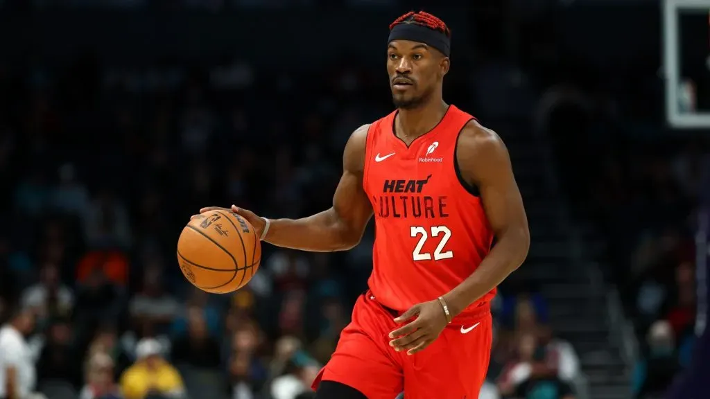Jimmy Butler #22 of the Miami Heat brings the ball up court during the second half of the game against the Charlotte Hornets.