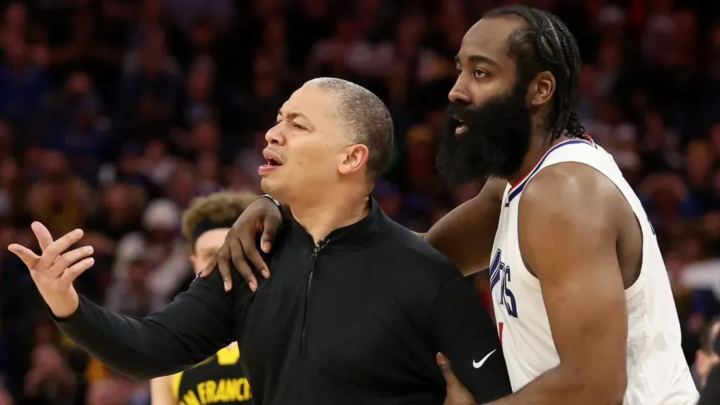 Lue and Harden looking at the team