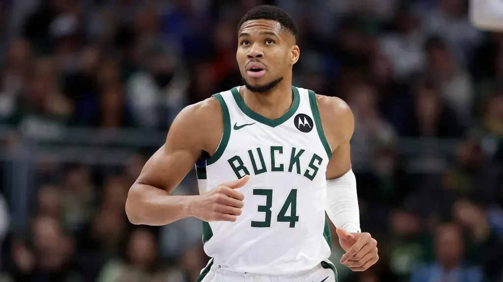 Giannis Antetokounmpo #34 of the Milwaukee Bucks runs down court after scoring during the first half of the game against the Portland Trail Blazers at Fiserv Forum.