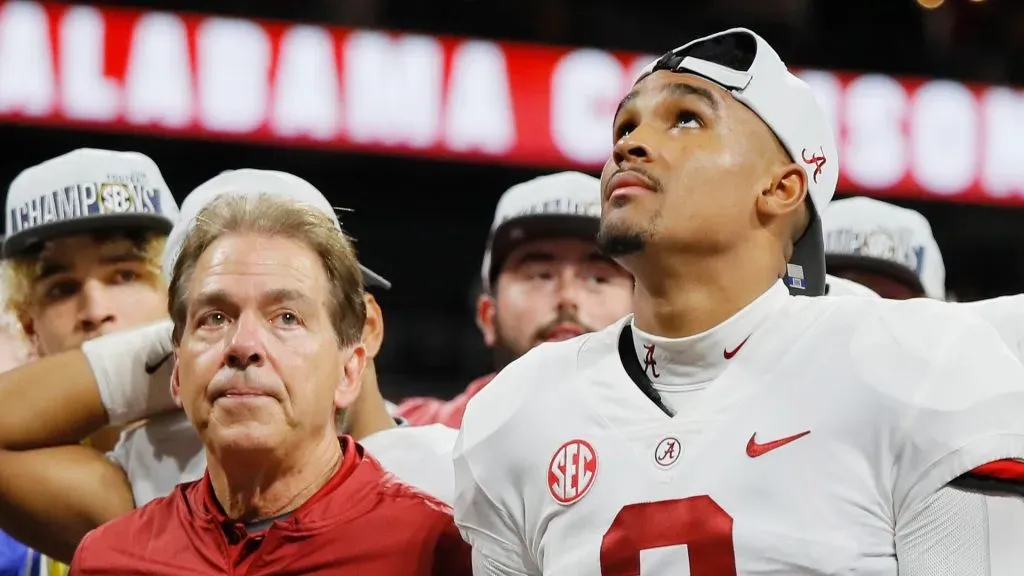 Head coach Nick Saban of the Alabama Crimson Tide and Jalen Hurts #2 react after defeating the Georgia Bulldogs 35-28 in the 2018 SEC Championship Game at Mercedes-Benz Stadium on December 1, 2018 in Atlanta, Georgia.