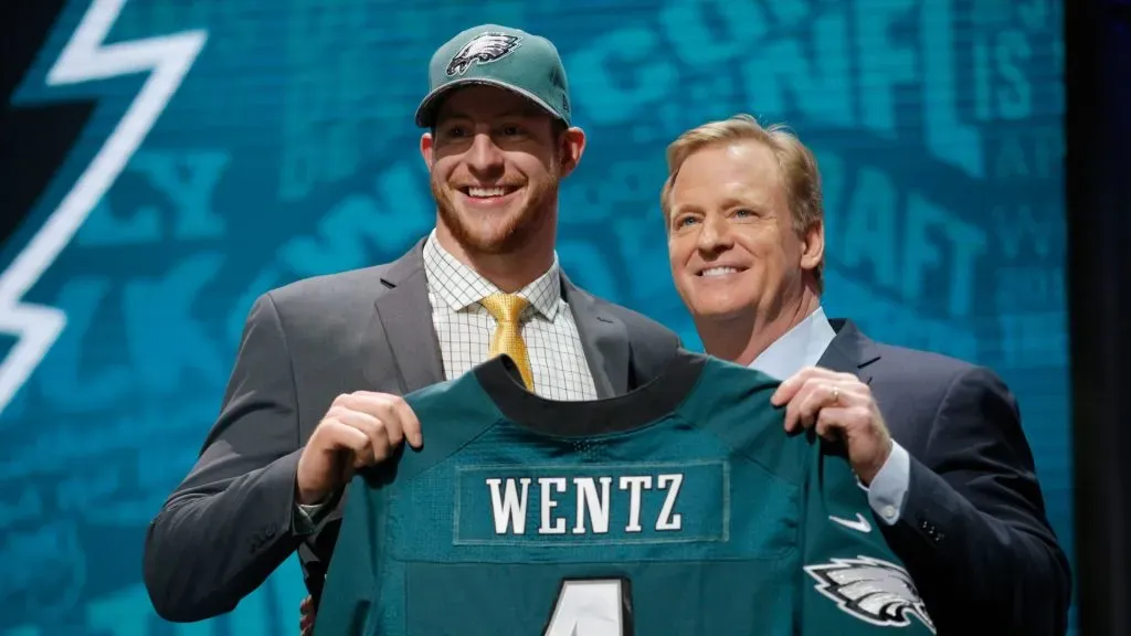 Carson Wentz of the North Dakota State Bison holds up a jersey with NFL Commissioner Roger Goodell after being picked #2 overall by the Philadelphia Eagles during the first round of the 2016 NFL Draft at the Auditorium Theatre of Roosevelt University on April 28, 2016 in Chicago, Illinois.