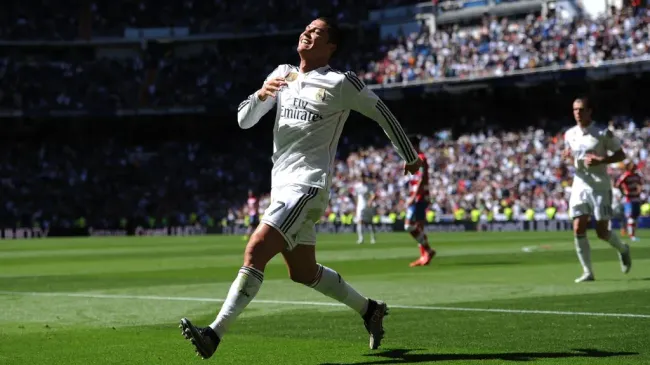 Cristiano Ronaldo celebrates scoring against Granada on April 5, 2015 ( Denis Doyle/Getty Images)