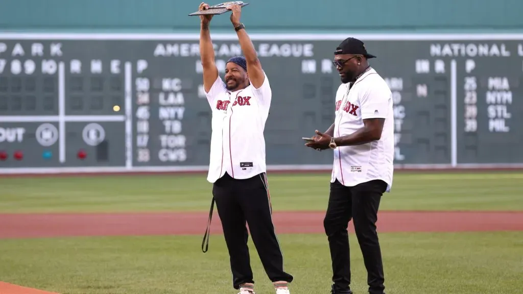 Boston Red Sox Hall of Famer Manny Ramirez is presented a plaque by Hall of Famer David Ortiz before a game against the Detroit Tigers at Fenway Park on June 20, 2022 in Boston, Massachusetts. (Photo by Paul Rutherford/Getty Images)