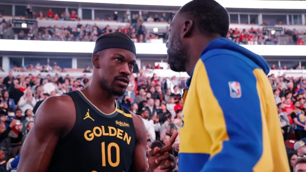 Jimmy Butler #10 of the Golden State Warriors talks with Draymond Green #23 prior to the game against the Chicago Bulls. (Michael Reaves/Getty Images)