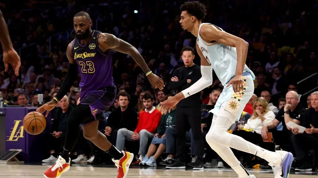 LeBron James #23 of the Los Angeles Lakers drives past Victor Wembanyama #1 of the San Antonio Spurs during the second quarter at Crypto.com Arena on January 13, 2025 in Los Angeles, California. (Photo by Katelyn Mulcahy/Getty Images)