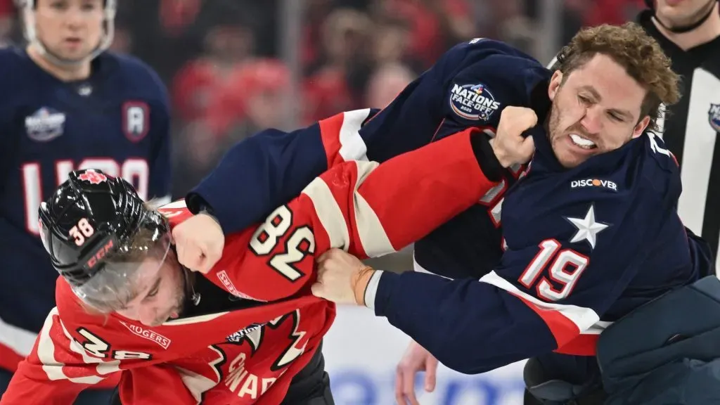 Matthew Tkachuk #19 of Team USA fights with Brandon Hagel #38 of Team Canada during the first period in the 4 Nations Face-Off game at the Bell Centre on February 15, 2025 in Montreal, Quebec, Canada.
