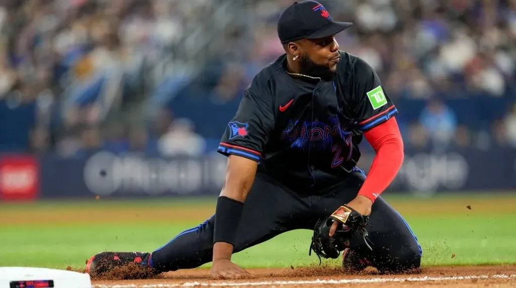 Vladimir Guerrero Jr. #27 of the Toronto Blue Jays makes a defensive play against the St. Louis Cardinals during the seventh inning at Rogers Centre on September 13, 2024 in Toronto, Canada. (Photo by Kevin Sousa/Getty Images)