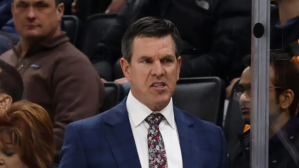 Head coach Mike Sullivan of the Pittsburgh Penguins talks to his players on the bench during the third period against the Boston Bruins at TD Garden on March 9, 2024 in Boston, Massachusetts.