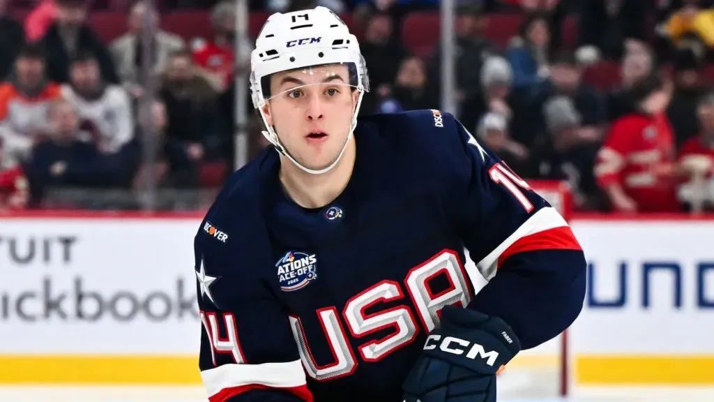 Brock Faber #14 of Team USA skates the puck during the second period against Team Finland in the 2025 NHL 4 Nations Face-Off at the Bell Centre on February 13, 2025 in Montreal, Quebec, Canada.