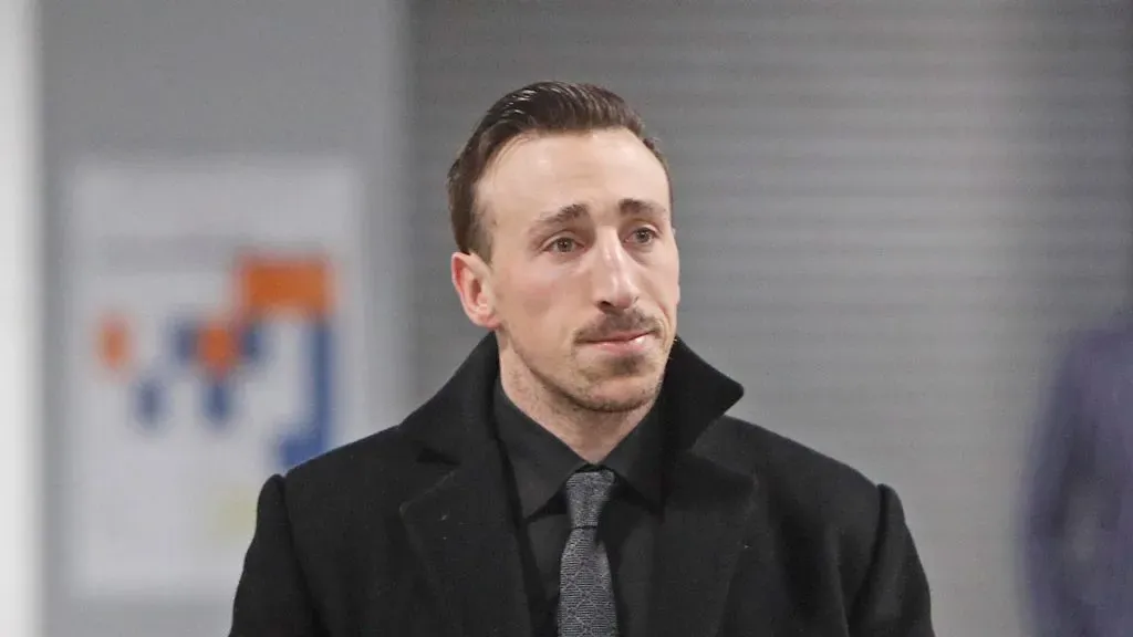 Brad Marchand #63 of the Boston Bruins arrives for the game against the New York Islanders at UBS Arena on January 18, 2023 in Elmont, New York.