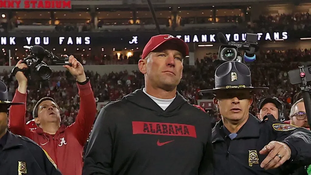 Head coach Kalen DeBoer of the Alabama Crimson Tide walks onto the field after defeating the Auburn Tigers 28 - 14 at Bryant-Denny Stadium on November 30, 2024 in Tuscaloosa, Alabama.