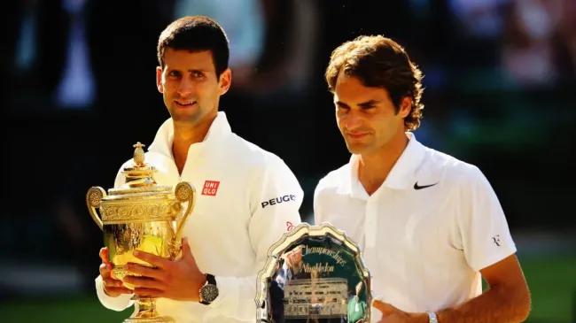 Djokovic and Federer after the 2014 Wimbledon final (Al Bello/Getty Images)