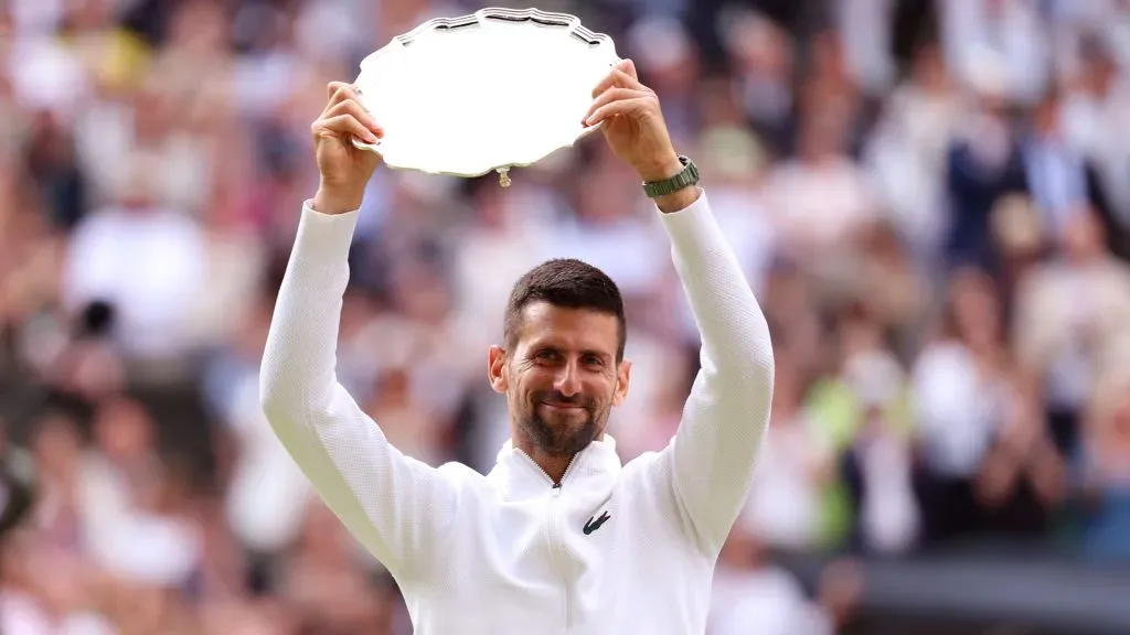 Novak Djokovic of Serbia with the runners up plate after his loss to Carlos Alcaraz of Spain in the 2024 Wimbledon final. (Julian Finney/Getty Images)