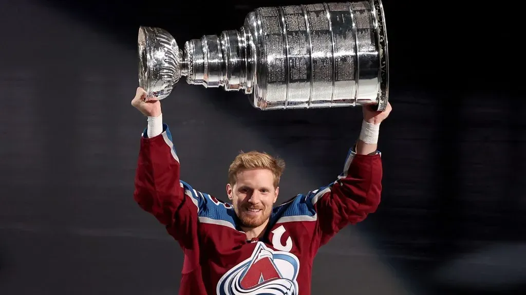 Gabriel Landeskog #92 of the Colorado Avalanche skates with the Stanley Cup at a ceremony celebrating their NHL Championship before their home opener against the Chicago Blackhawks at Ball Arena on October 12, 2022 in Denver, Colorado.