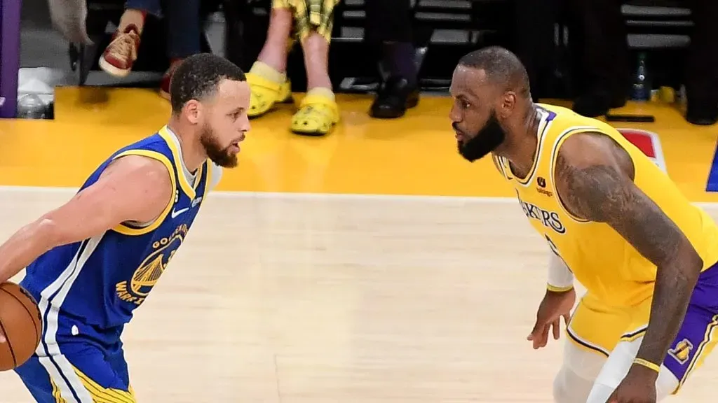 Stephen Curry #30 of the Golden State Warriors dribbles the ball against LeBron James #6 of the Los Angeles Lakers during Game Four of the Western Conference Semi-Finals of the 2023 NBA Playoffs