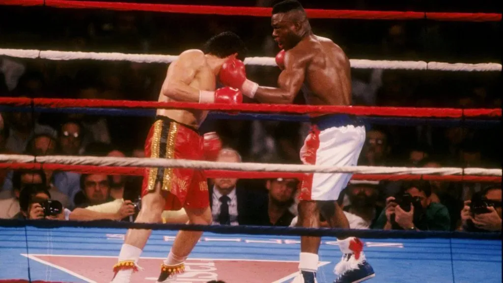 Meldrick Taylor lands a left to Julio Cesar Chavez during a fight in 1990. (Source: Ken Levine /Allsport)