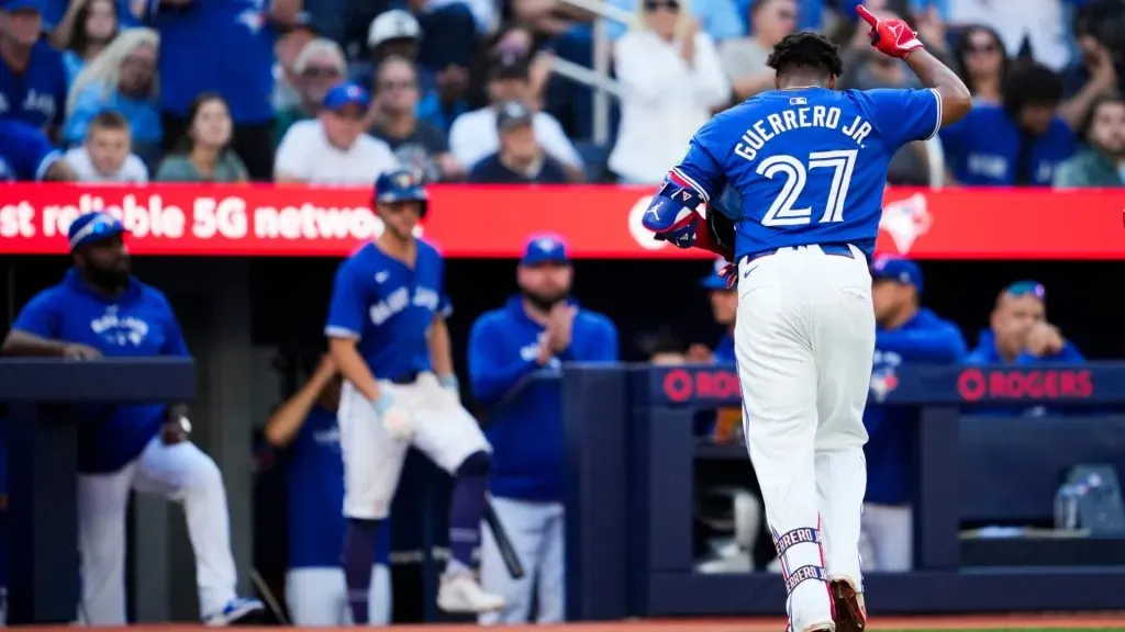 Vladimir Guerrero Jr. #27 of the Toronto Blue Jays salutes the crowd while coming out of the game after drawing a walk for his last at bat of the season, against the Miami Marlins, in their MLB game at the Rogers Centre on September 29, 2024 in Toronto, Ontario, Canada. (Photo by Mark Blinch/Getty Images)