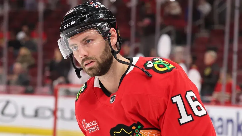 Jason Dickinson #16 of the Chicago Blackhawks warms up prior to the game against the Seattle Kraken at the United Center on March 18, 2025 in Chicago, Illinois.