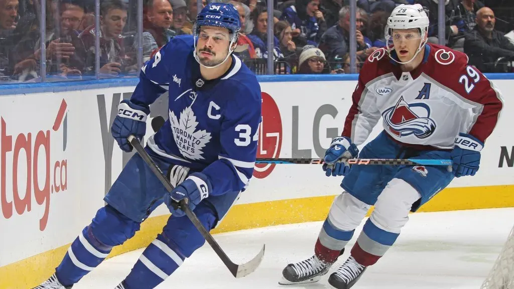 : Nathan McKinnon #29 of the Colorado Avalanche skates against Auston Matthews #34 of the Toronto Maple Leafs during the second period in an NHL game at Scotiabank Arena on March 19, 2025 in Toronto, Ontario, Canada. (Photo by Claus Andersen/Getty Images)