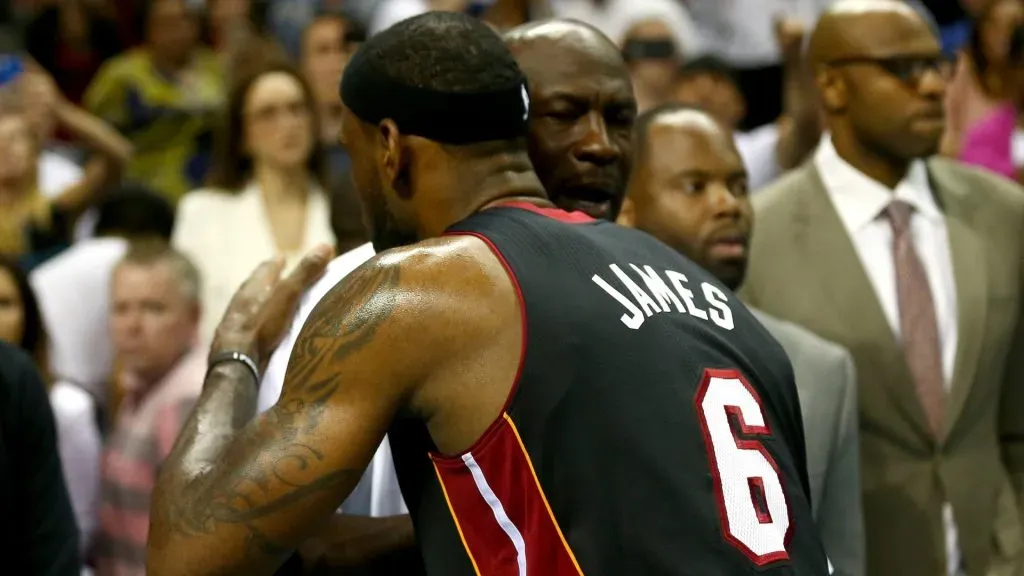 LeBron James #6 of the Miami Heat hugs Michael Jordan after defeating the Charlotte Bobcats 109-98 in Game Four of the Eastern Conference Quarterfinals during the 2014 NBA Playoffs at Time Warner Cable Arena on April 28, 2014 in Charlotte, North Carolina.