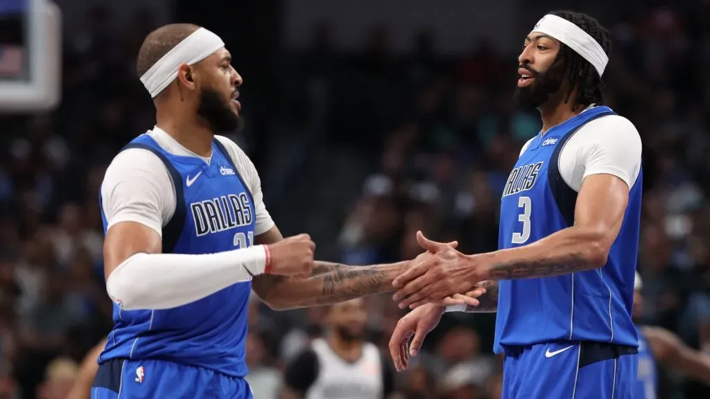 Anthony Davis (R) #3 and Daniel Gafford #21 of the Dallas Mavericks celebrate together after a score during the second quarter against the Brooklyn Nets. (Sam Hodde/Getty Images)