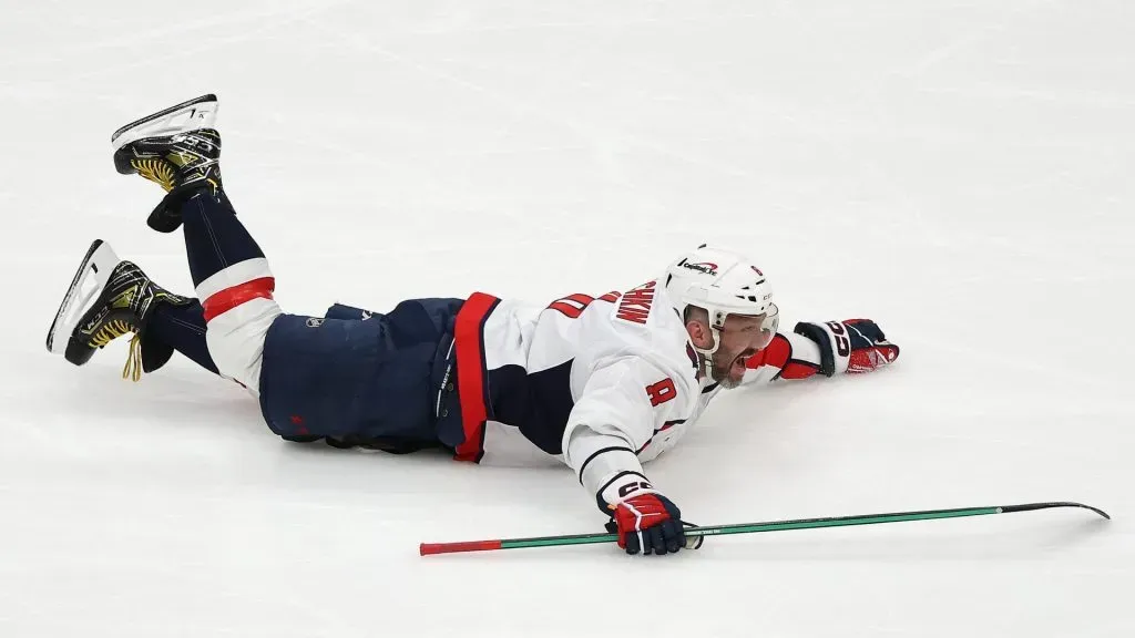 Alex Ovechkin #8 of the Washington Capitals celebrates after scoring his 895th career goal during the second period against the New York Islanders at UBS Arena on April 06, 2025 in Elmont, New York. Ovechkin’s goal passes Wayne Gretzky’s 894 goals to become the NHL all-time goal-scoring leader.