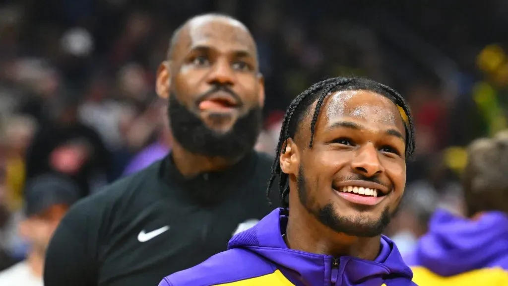Bronny James #9 and LeBron James #23 of the Los Angeles Lakers warms up prior to the game against the Cleveland Cavaliers