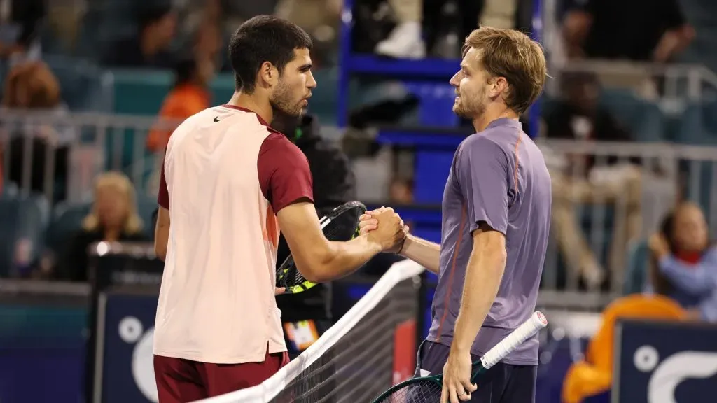 David Goffin of Belgium meets Carlos Alcaraz of Spain after defeating him during Day 4 of the Miami Open. (Al Bello/Getty Images)